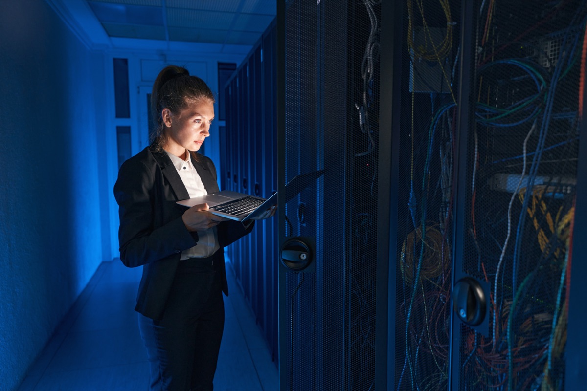 Engineer working in a server room